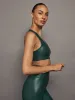 Action Bra 2.0 in Takara Shine - Ponderosa Pine sold by Carbon38