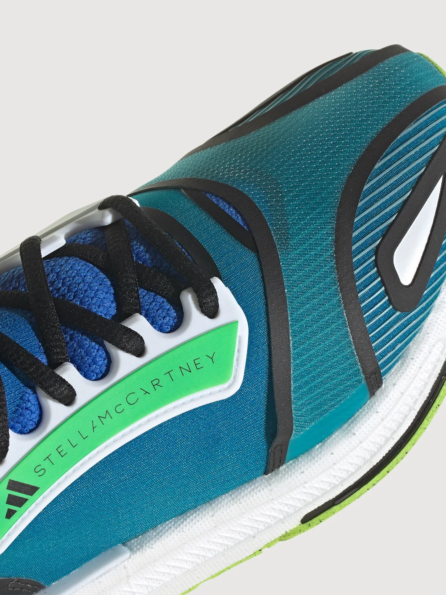 adidas by Stella McCartney ULTRABOOST 23 - GLORY BLUE/ALMOST BLUE/SOLAR YELLOW sold by Carbon38 product image thumbnail 4