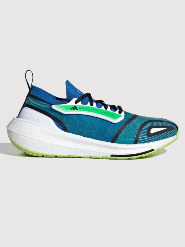 adidas by Stella McCartney ULTRABOOST 23 - GLORY BLUE/ALMOST BLUE/SOLAR YELLOW sold by Carbon38