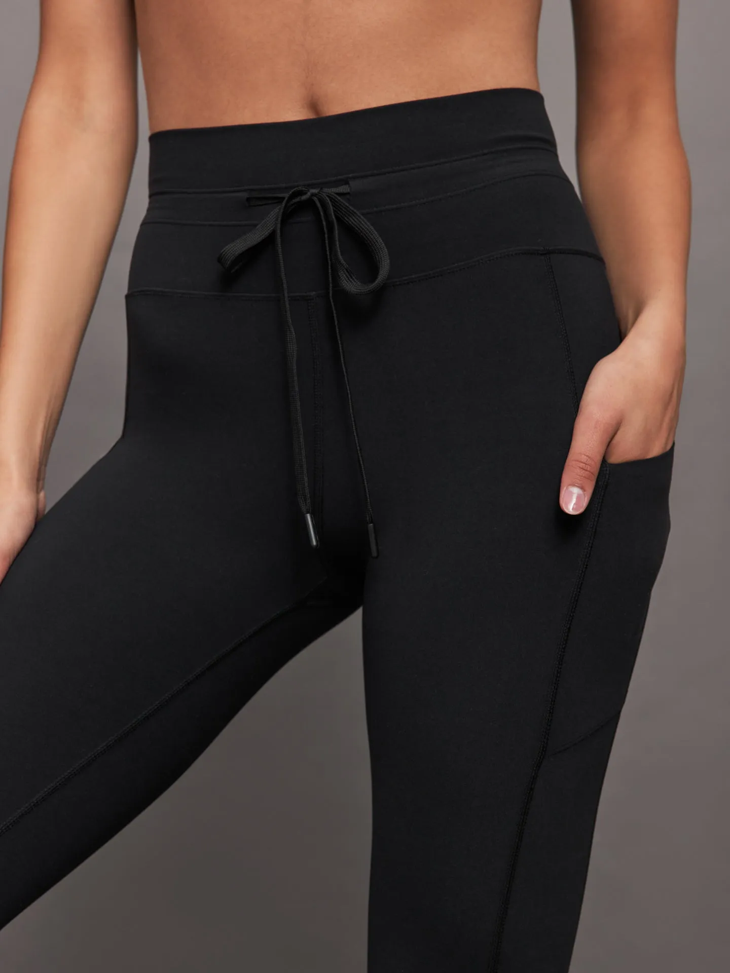 High Rise Sport Pocket Legging in Melt - Black sold by Carbon38