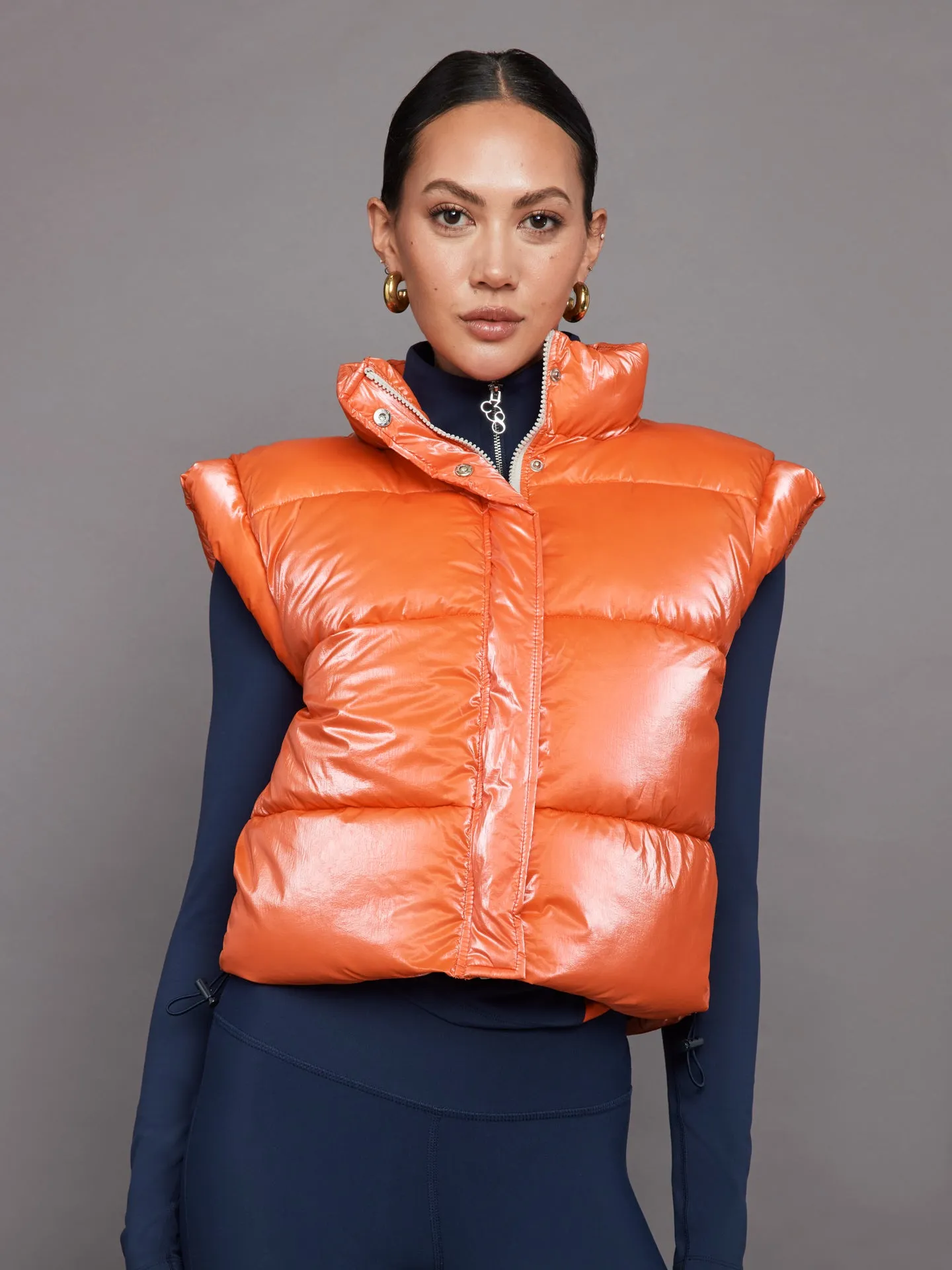 Puffer Vest - Orange sold by Carbon38