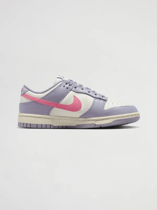 Nike Dunk Low - INDIGO HAZE/CORAL CHALK-SAIL sold by Carbon38