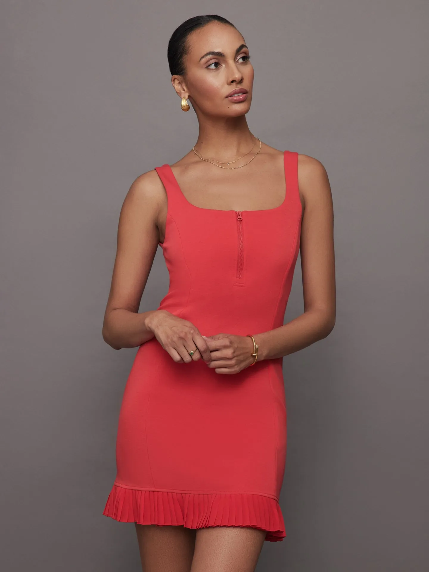 Pleated Hem Tennis Dress in Scuba - Tomato sold by Carbon38