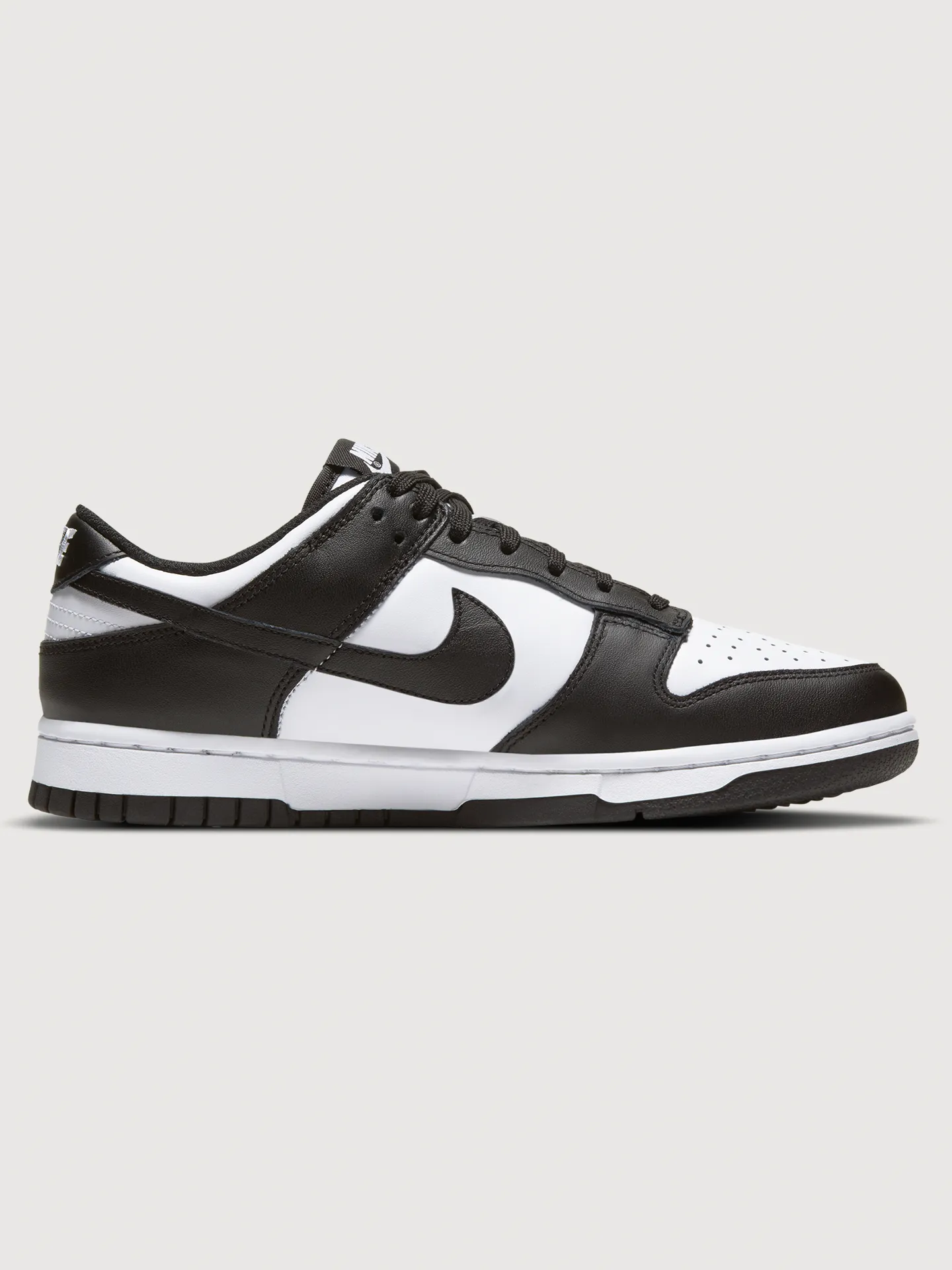 Nike Dunk Low - White/Black-White sold by Carbon38