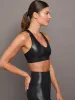 Action Bra 2.0 in Takara Shine - Black sold by Carbon38