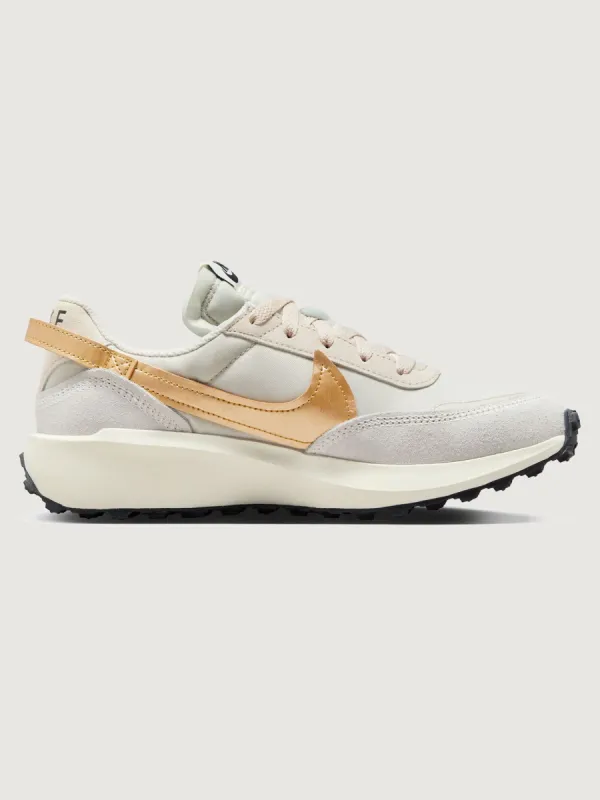 Wmns Nike Waffle Debut Ess - LT Orewood Brn/Metallic Gold-Sail-Black sold by Carbon38