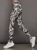 adidas by Stella McCartney TruePace Running Leggings Long Printed - Chalk Pearl/Black sold by Carbon38