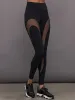 Sheer Spliced Legging in Melt - Black sold by Carbon38
