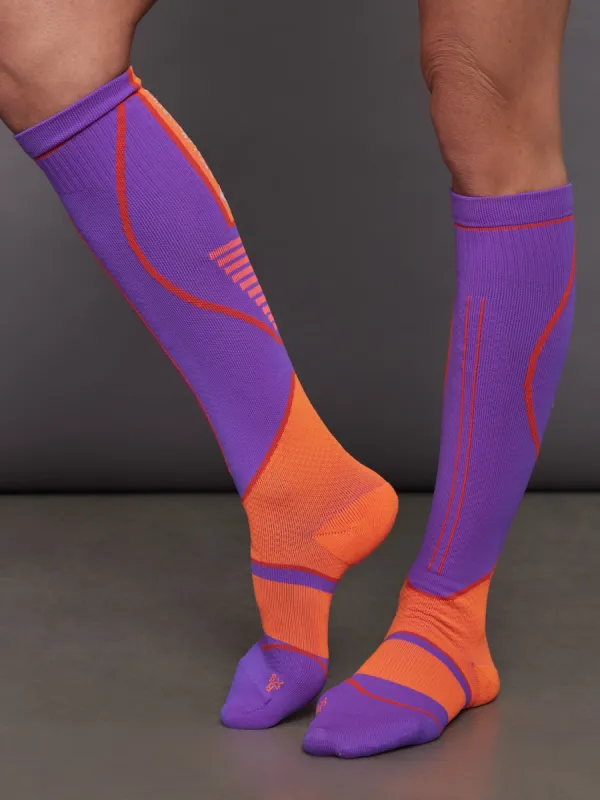 adidas by Stella McCartney High Socks - Shock Purple/Signal Orange Mel/Active Orange sold by Carbon38