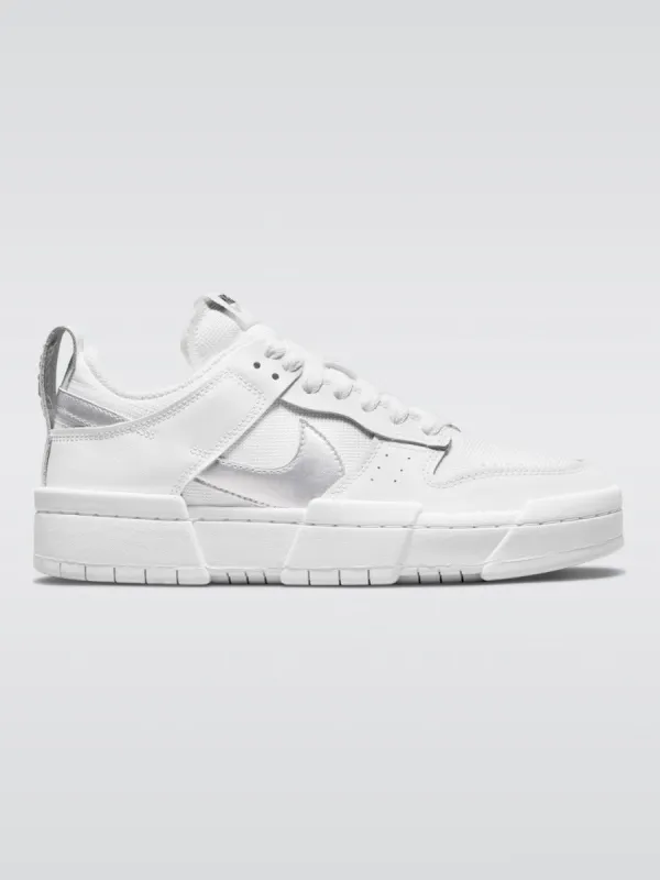 Dunk Low Disrupt Sneaker - White/Metallic Silver-Black sold by Carbon38