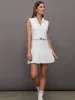 Pleated Tennis Dress in Scuba - White sold by Carbon38