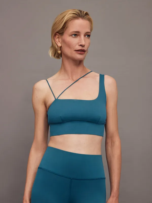 Asymmetrical Strappy Bra in Diamond Compression - Deep Lagoon sold by Carbon38