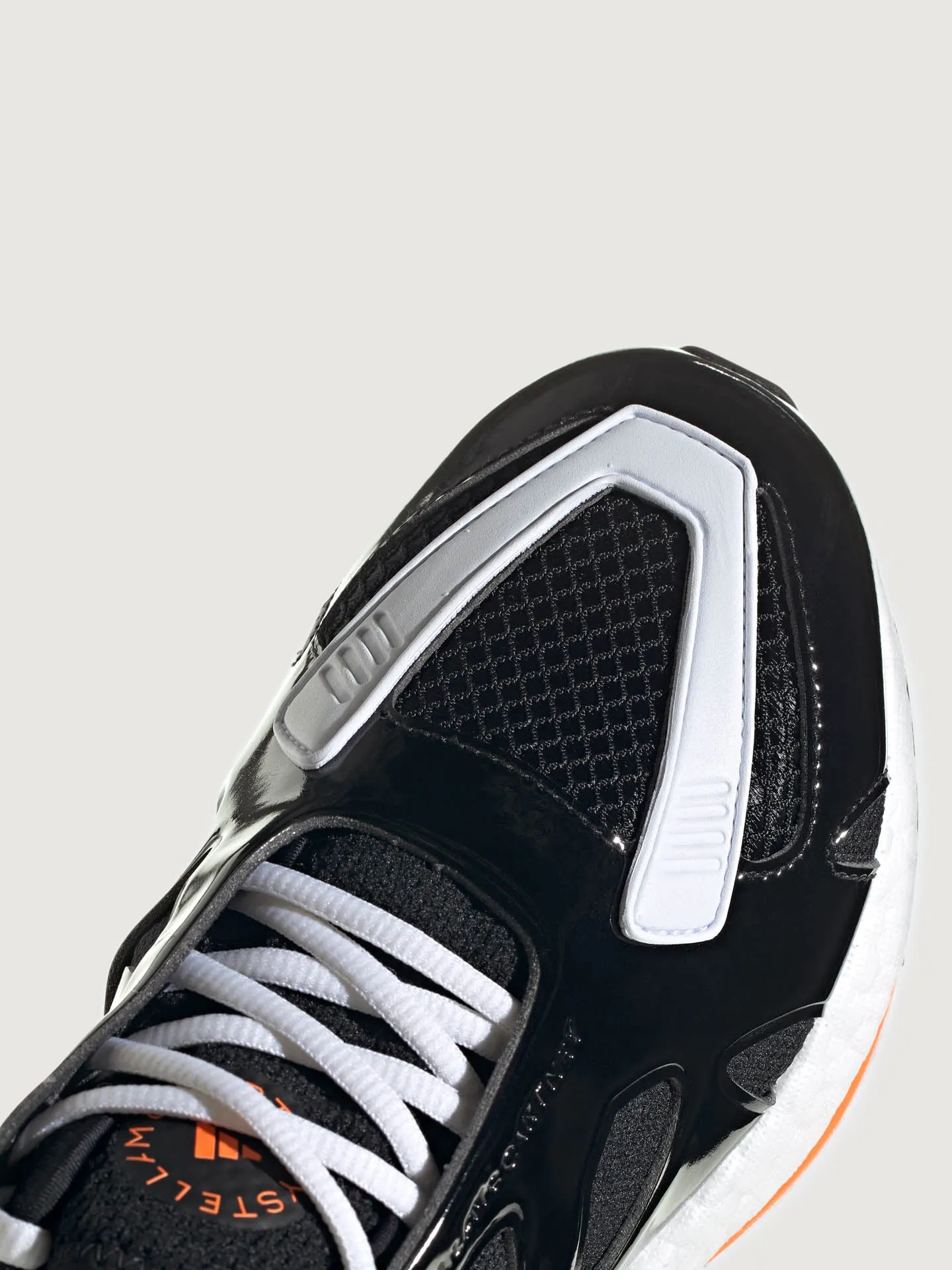 adidas by Stella McCartney ULTRABOOST 22 - CORE BLACK/FTWR WHITE/SIGNAL ORANGE sold by Carbon38 product image thumbnail 4