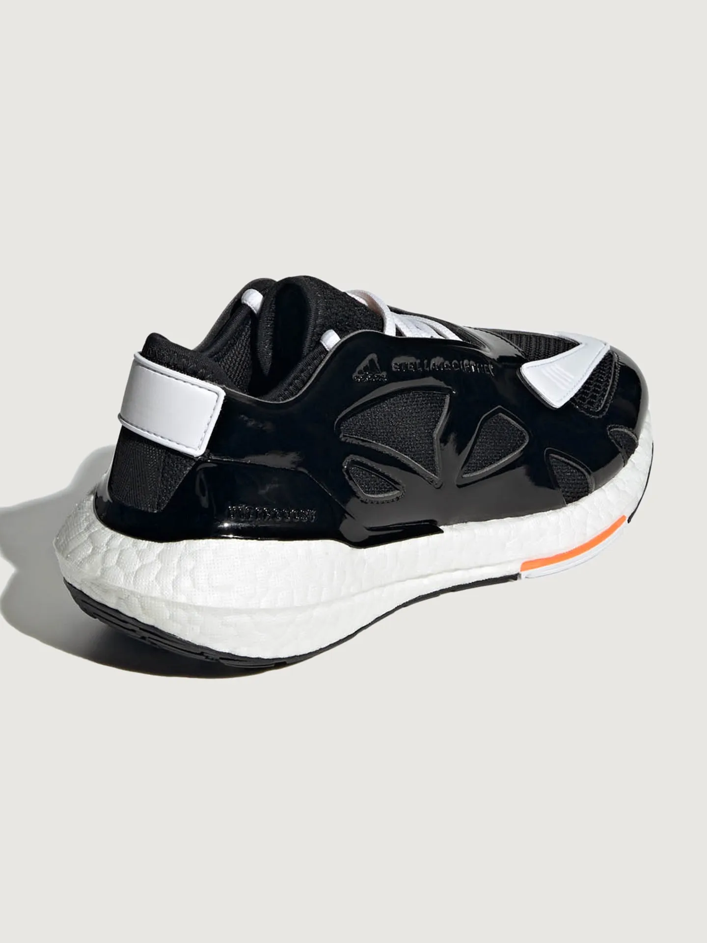 adidas by Stella McCartney ULTRABOOST 22 - CORE BLACK/FTWR WHITE/SIGNAL ORANGE sold by Carbon38 product image thumbnail 3