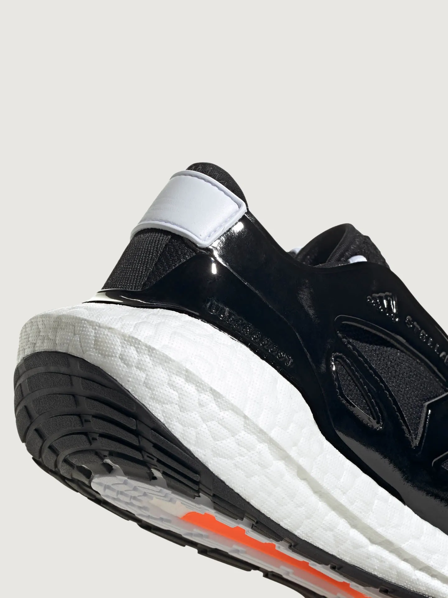 adidas by Stella McCartney ULTRABOOST 22 - CORE BLACK/FTWR WHITE/SIGNAL ORANGE sold by Carbon38 product image thumbnail 5