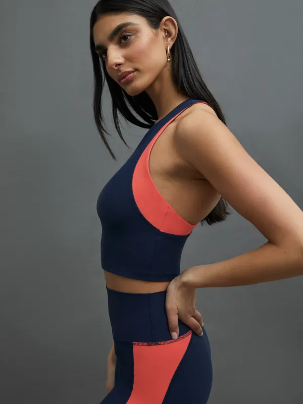 COLORBLOCK HIGH NECK BRA - CORE NAVY/ CAYENNE sold by Carbon38