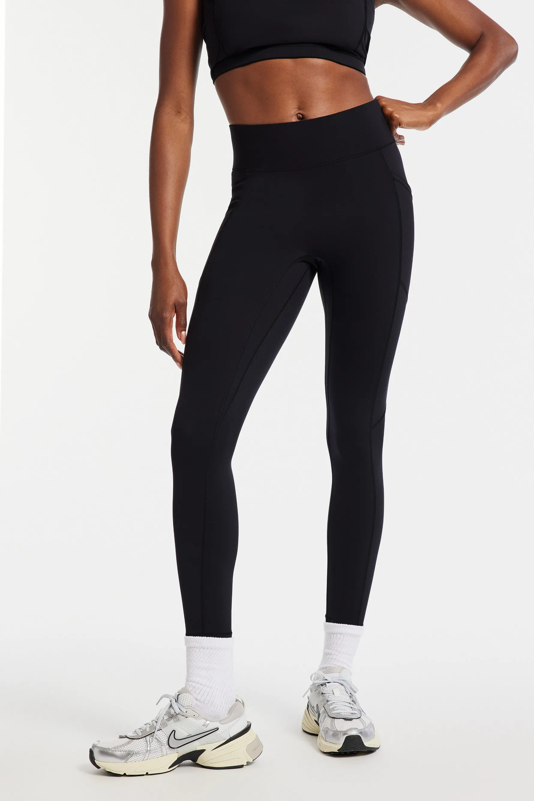 Center Stage Pocket Legging - Black sold by Carbon38