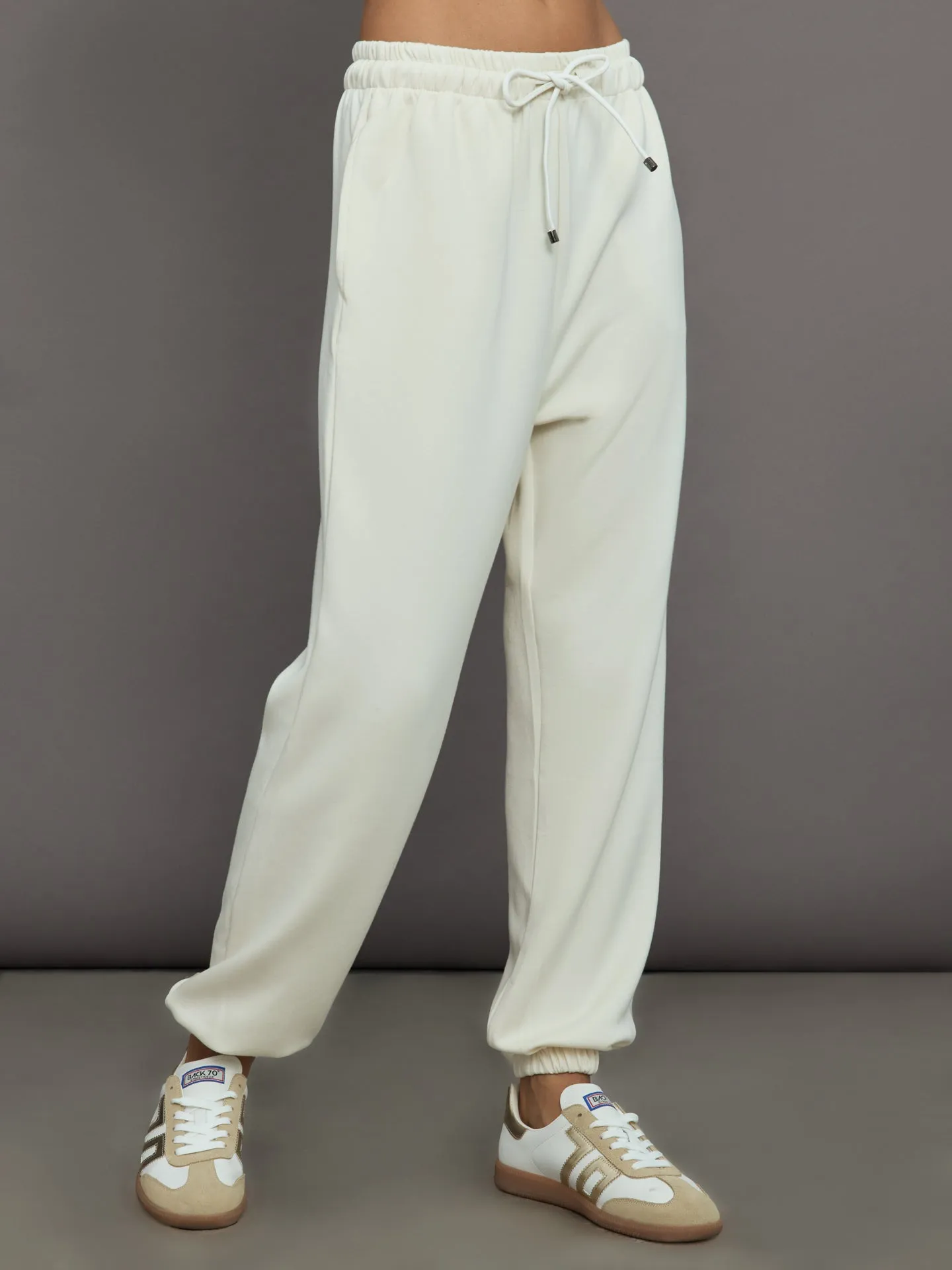 Cleo Cupro Track Pant - Ivory sold by Carbon38