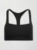 Racerback Bra in Ribbed Melt - Black sold by Carbon38