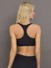 Racerback Bra in Ribbed Melt - Black sold by Carbon38