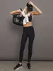 Racerback Bra in Ribbed Melt - Black sold by Carbon38