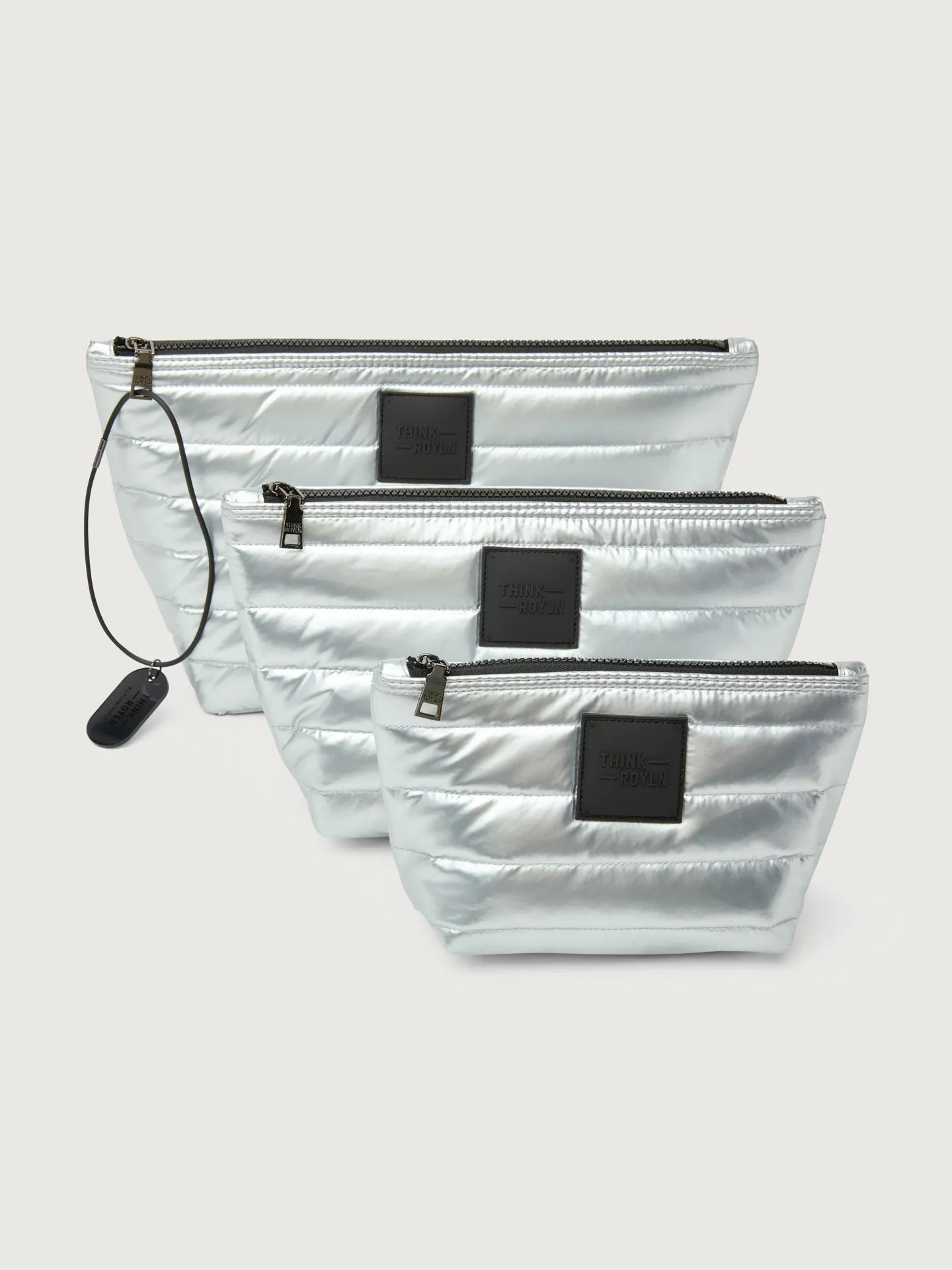 Travel Trio - Pearl Silver sold by Carbon38