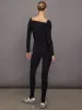 Off Shoulder Sweetheart Catsuit W/ Footie - Black sold by Carbon38