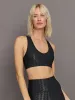 Action Bra 2.0 in Houndstooth Takara Shine - Black sold by Carbon38