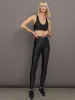 Action Bra 2.0 in Houndstooth Takara Shine - Black sold by Carbon38
