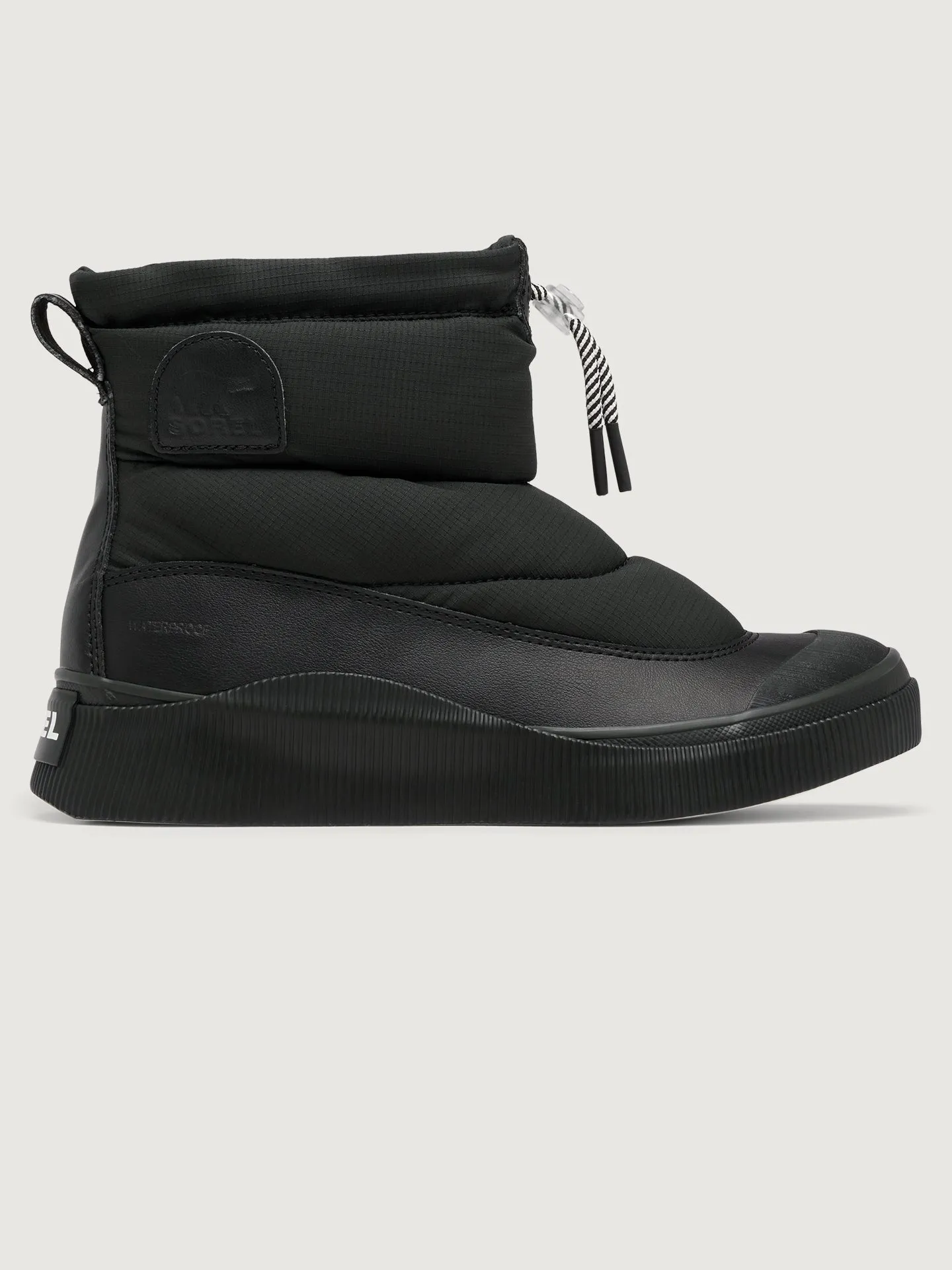 Out N About™ IV Puffy WP - Black/Chalk sold by Carbon38