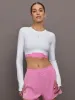Train Long-Sleeve Crop - White | Raspberry sold by Carbon38