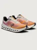 Cloudsurfer Next - Tangerine | Ivory sold by Carbon38