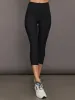 High Rise Melt Capri Legging in Melt- Black sold by Carbon38