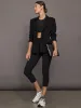 High Rise Melt Capri Legging in Melt- Black sold by Carbon38