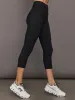 High Rise Melt Capri Legging in Melt- Black sold by Carbon38