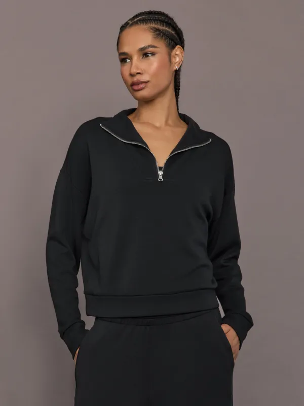 Half Zip Pullover in Interlock - Black sold by Carbon38