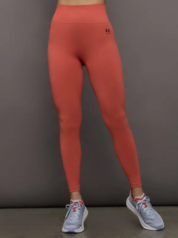 Restore Seamless Legging - Brick Red sold by Carbon38