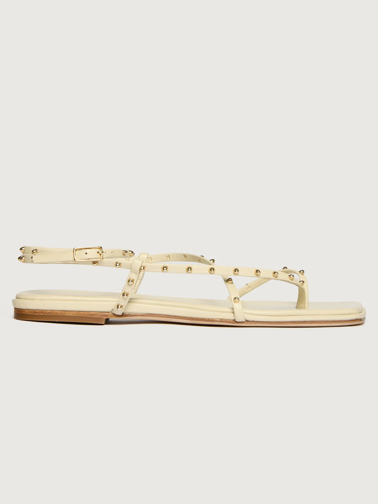 Alexia - Vanilla Calf With Gold Studs sold by Carbon38