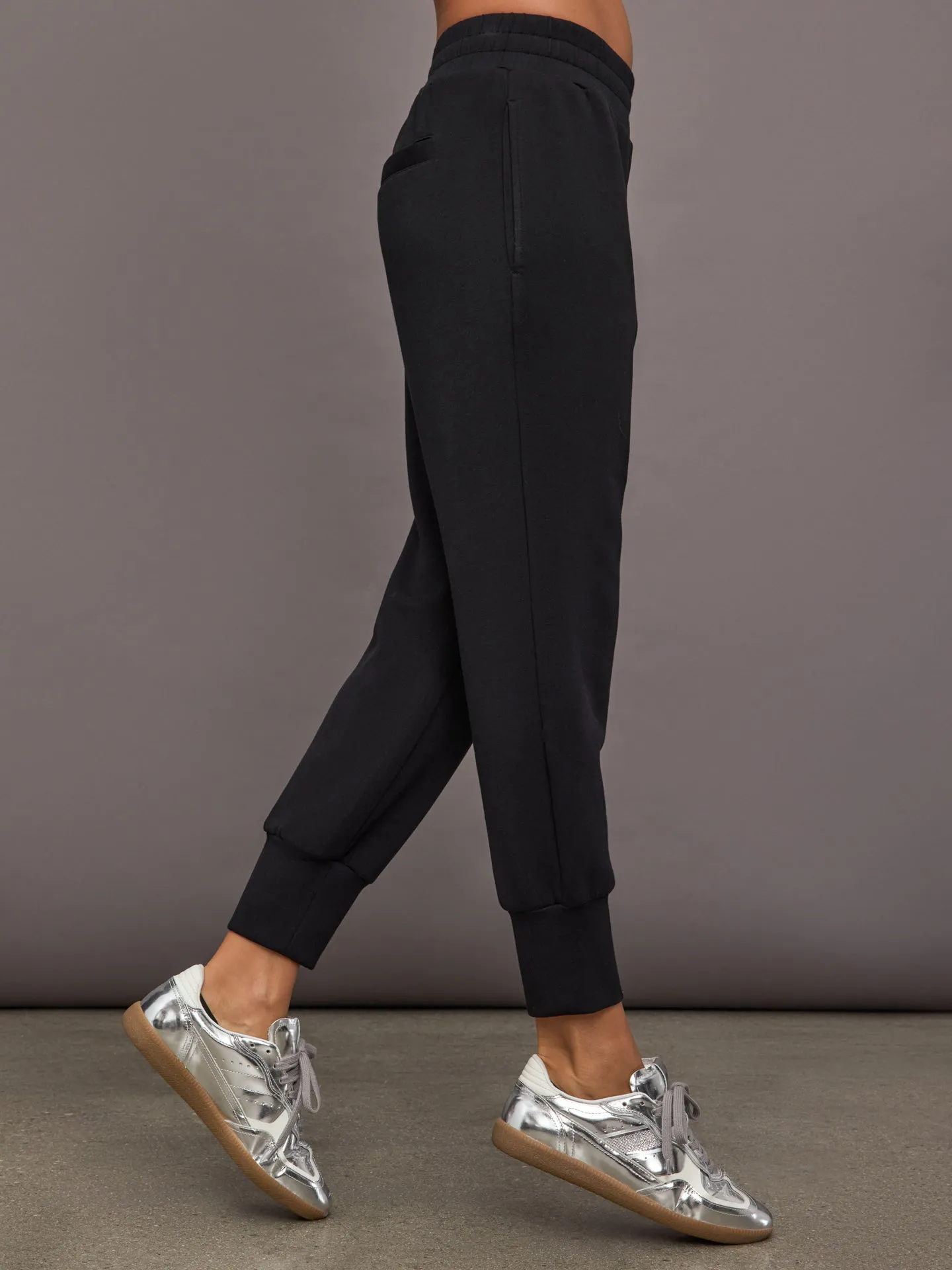 The Slim Cuff Pant 25” - Black sold by Carbon38