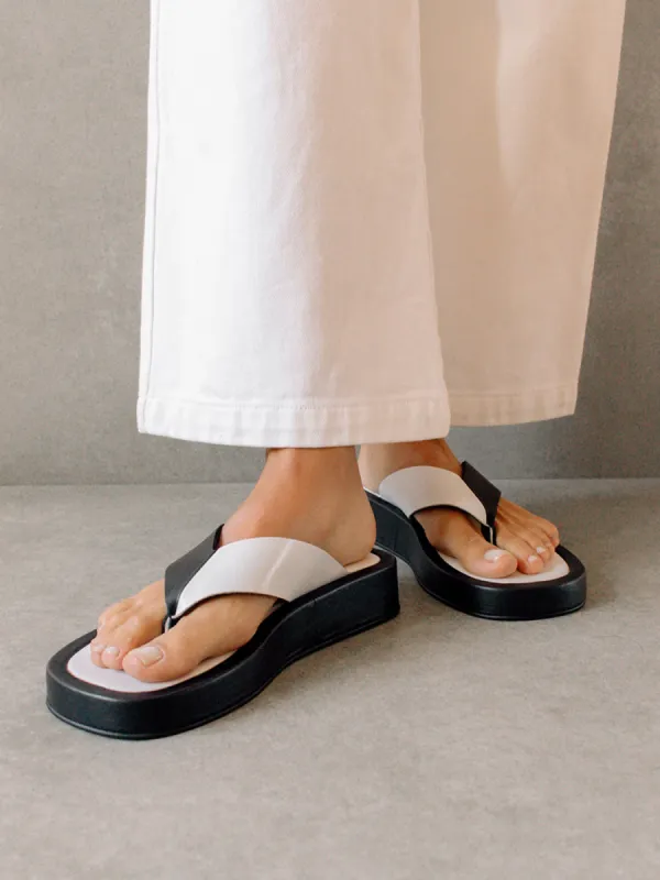 Overcast Bicolor - Black Bright White sold by Carbon38