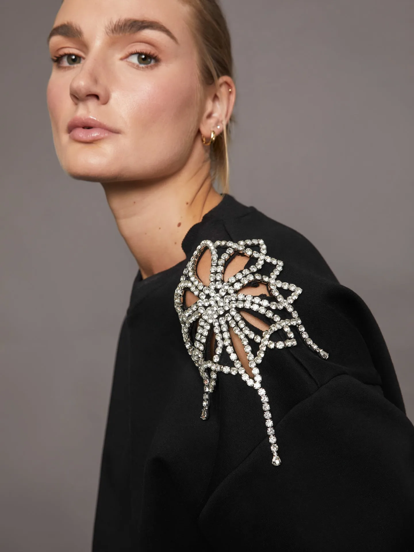 Rhinestone Cut Out Sweatshirt - Black sold by Carbon38