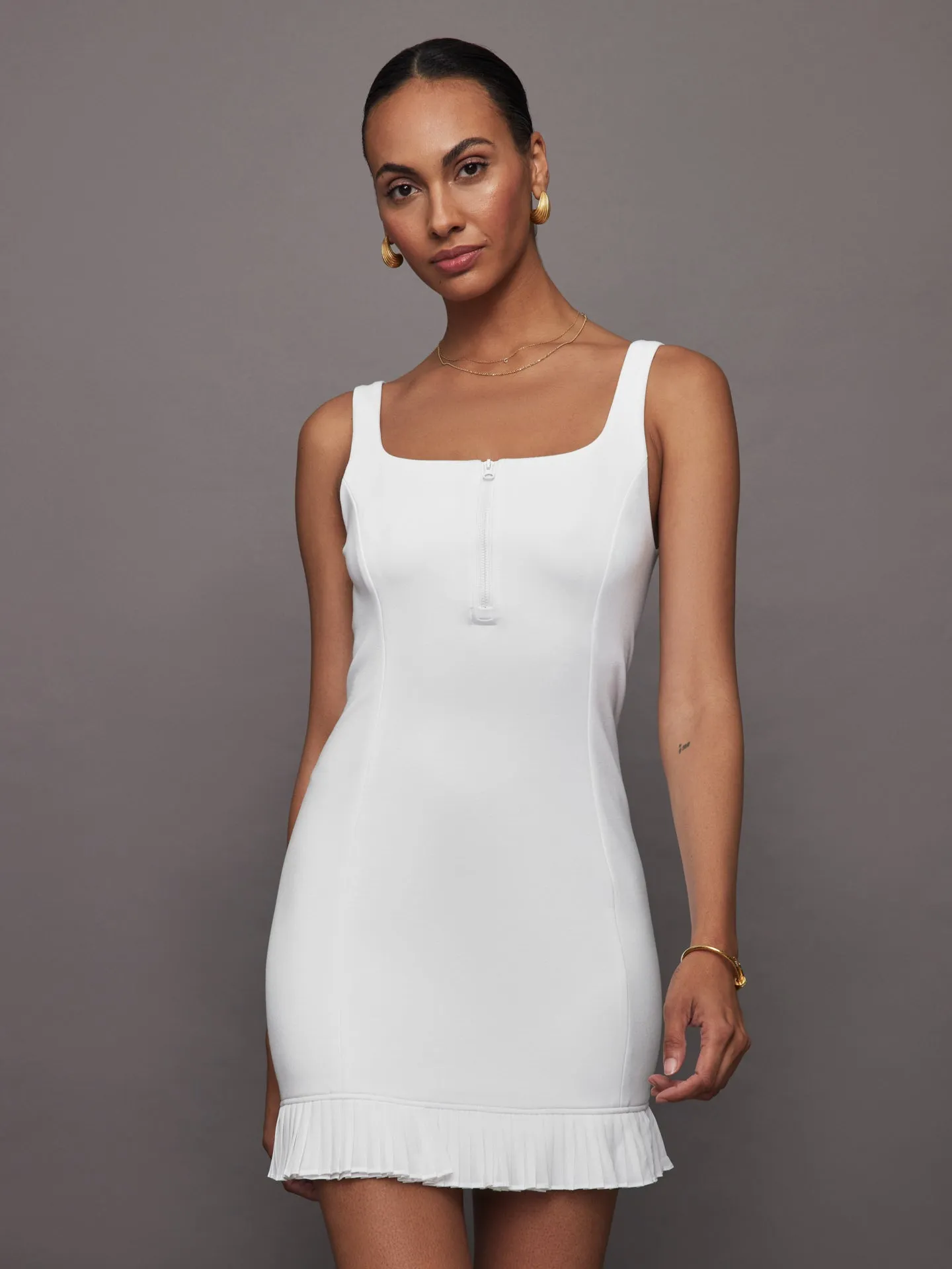 Pleated Hem Tennis Dress in Scuba - White sold by Carbon38
