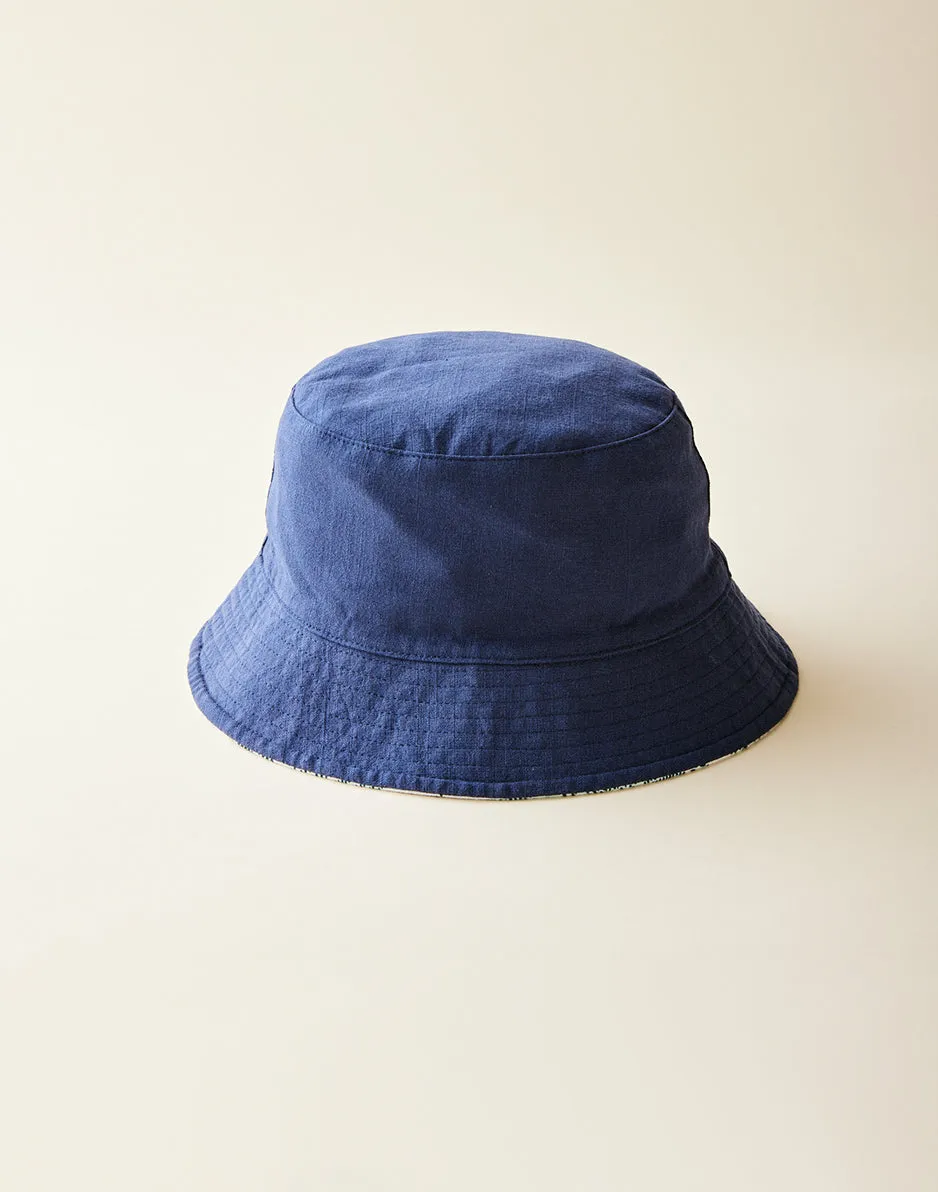 Reversible Bucket Hat: Navy/Olas sold by Carve Designs