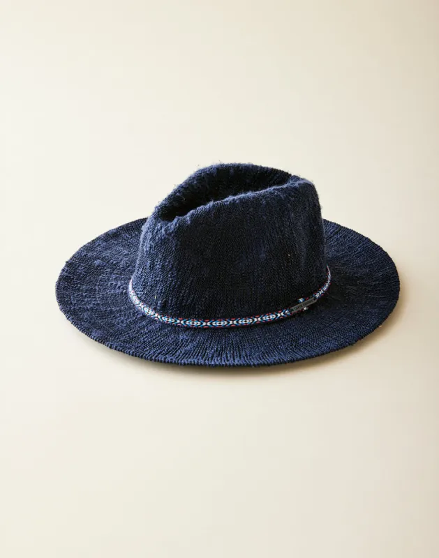 Capistrano Crushable Hat: Navy sold by Carve Designs