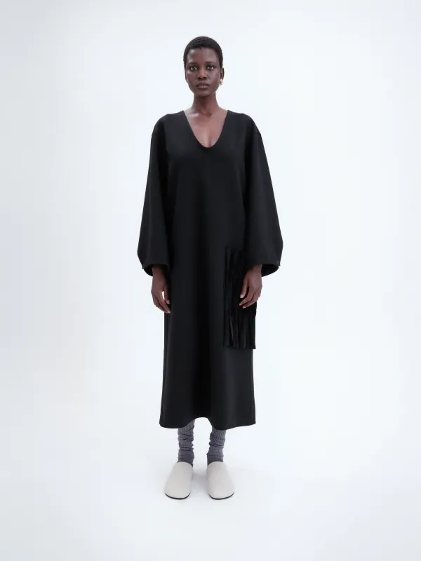 Robe poche brodée en laine double face sold by Carven