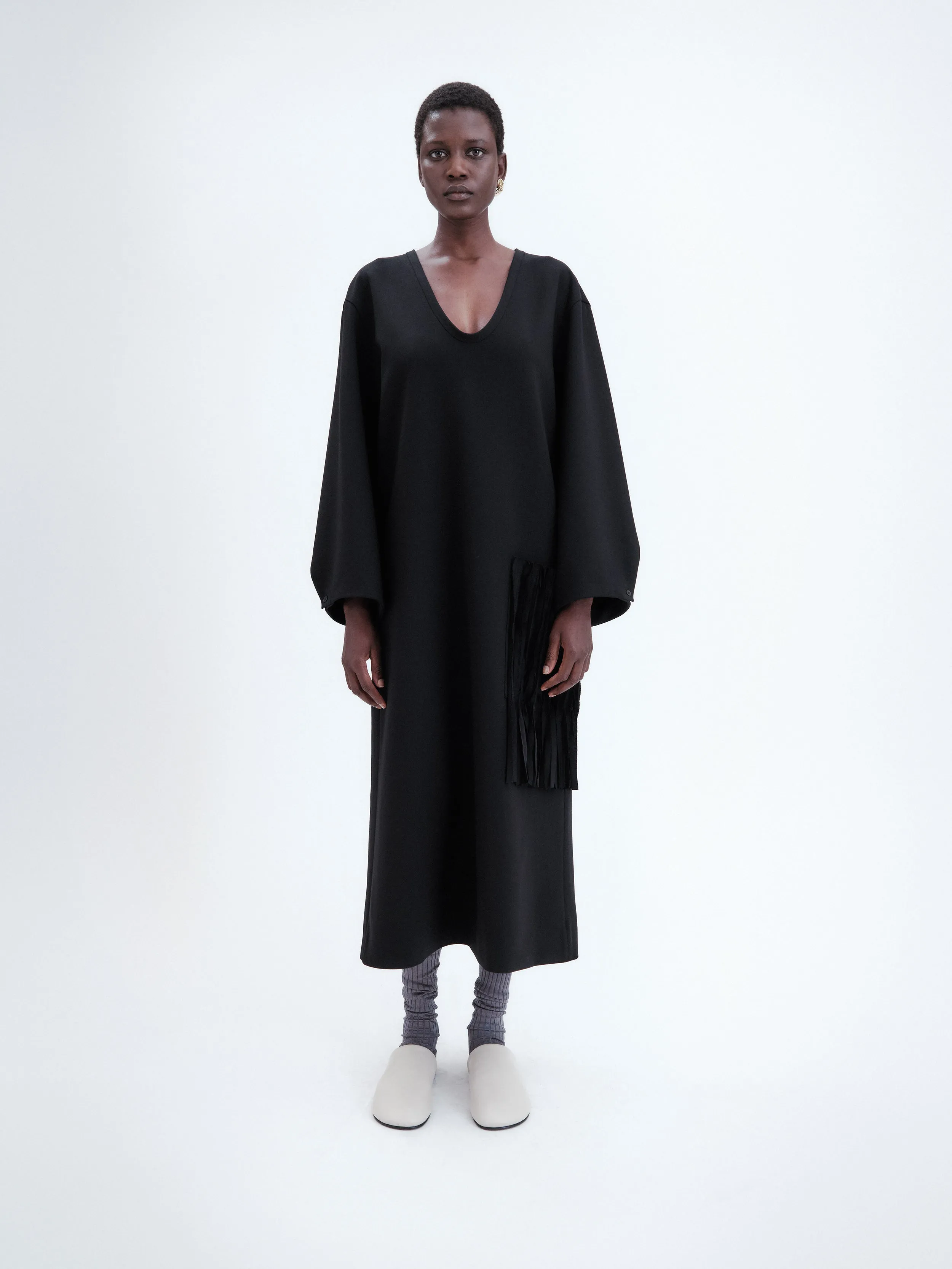 Robe poche brodée en laine double face sold by Carven