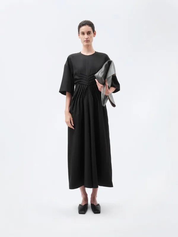 Robe à plis en grain de poudre made by Carven