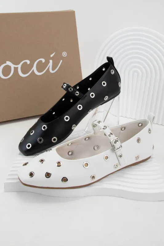 WHEREAS GROMMET DECOR SQUARE TOE MARY JANE FLATS sold by CCOCCI