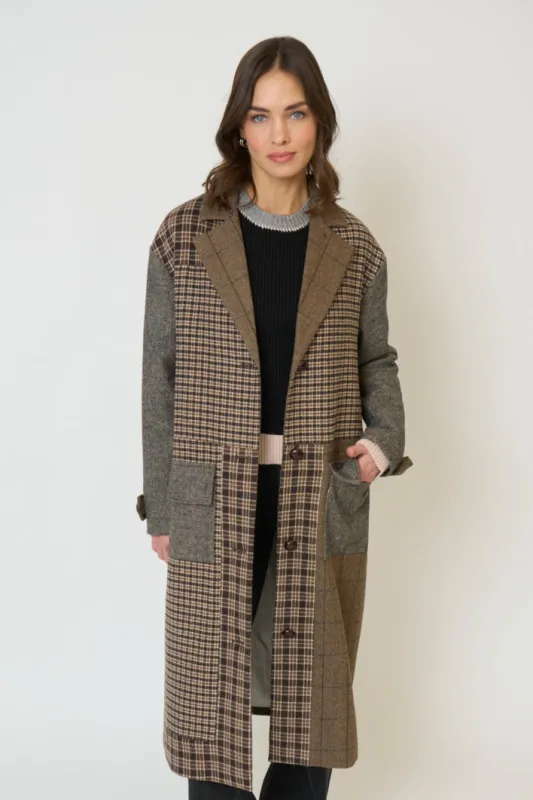 Raven Patchwork Long Coat sold by Central Park West