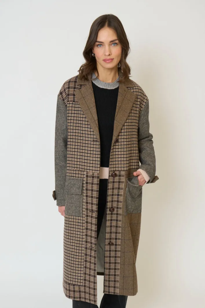 Raven Patchwork Long Coat sold by Central Park West